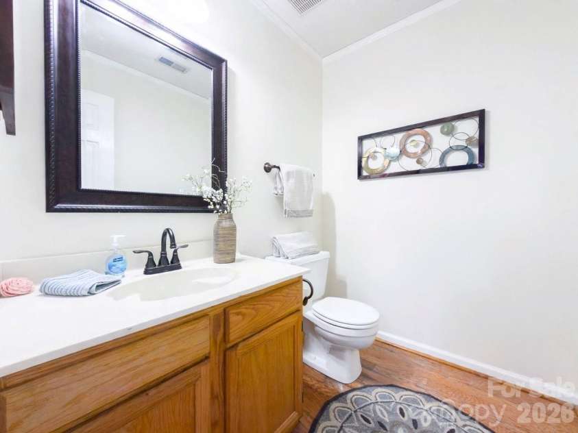 235 Withershinn Drive, Charlotte, NC 28262.  MLS# CAR4414548, YatesRealty ID 46207. Half bath on main level