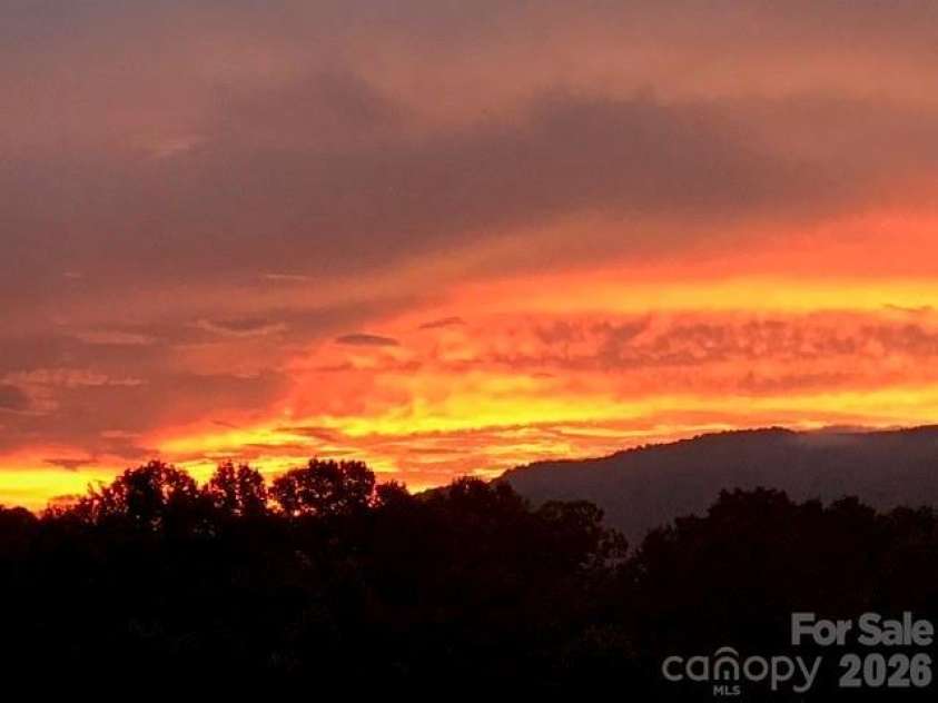 92 Lindon Cove Road, Candler, NC 28715.  MLS# CAR4415627, YatesRealty ID 46224. Beautiful Sunsets!