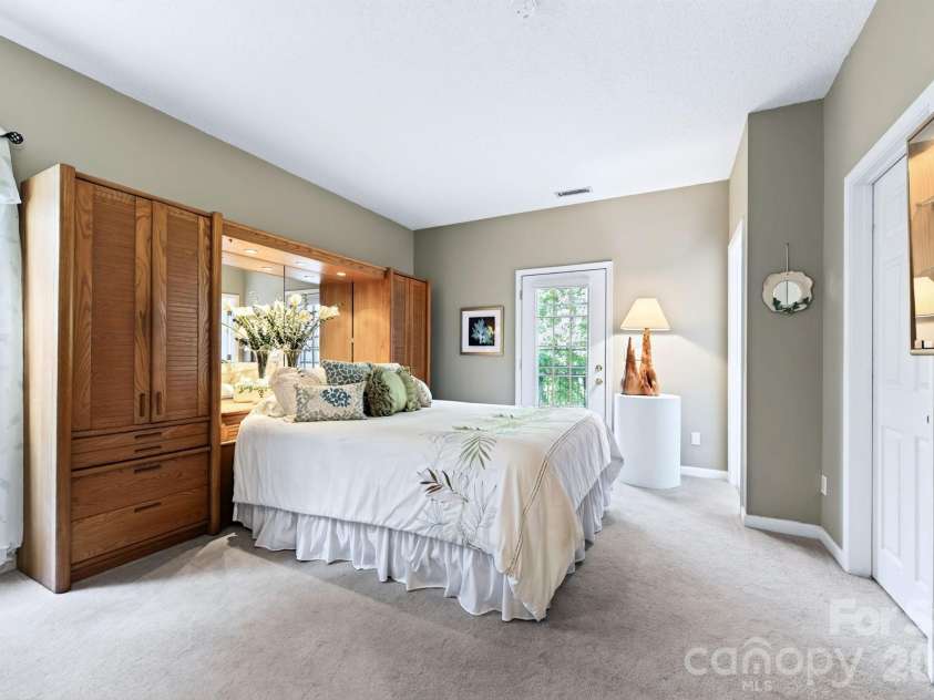 92 Lindon Cove Road, Candler, NC 28715.  MLS# CAR4415627, YatesRealty ID 46224. Generous Primary Bedroom