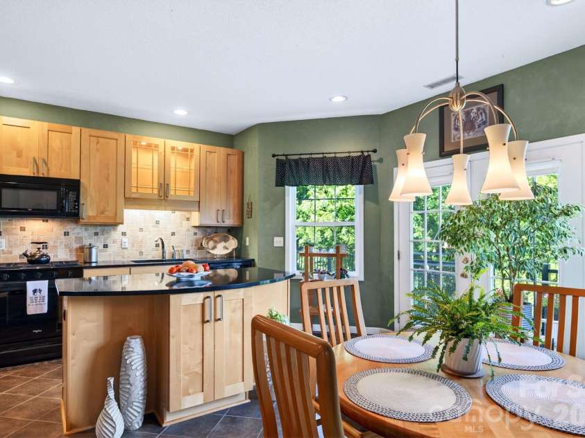 92 Lindon Cove Road, Candler, NC 28715.  MLS# CAR4415627, YatesRealty ID 46224. Open Kitchen and Dining