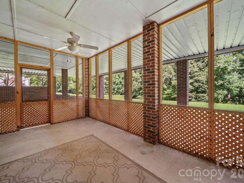 3008 Eaker Drive, Cherryville, NC 28021.  MLS# CAR4410929, YatesRealty ID 46228. Downstairs/basement screened-in porch