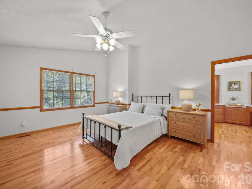 3008 Eaker Drive, Cherryville, NC 28021.  MLS# CAR4410929, YatesRealty ID 46228. The primary suite includes a large bedroom, bathroom, and walk-in closet.