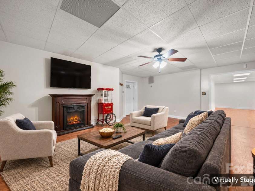 3008 Eaker Drive, Cherryville, NC 28021.  MLS# CAR4410929, YatesRealty ID 46228. This space has been virtually staged as a second hangout space.