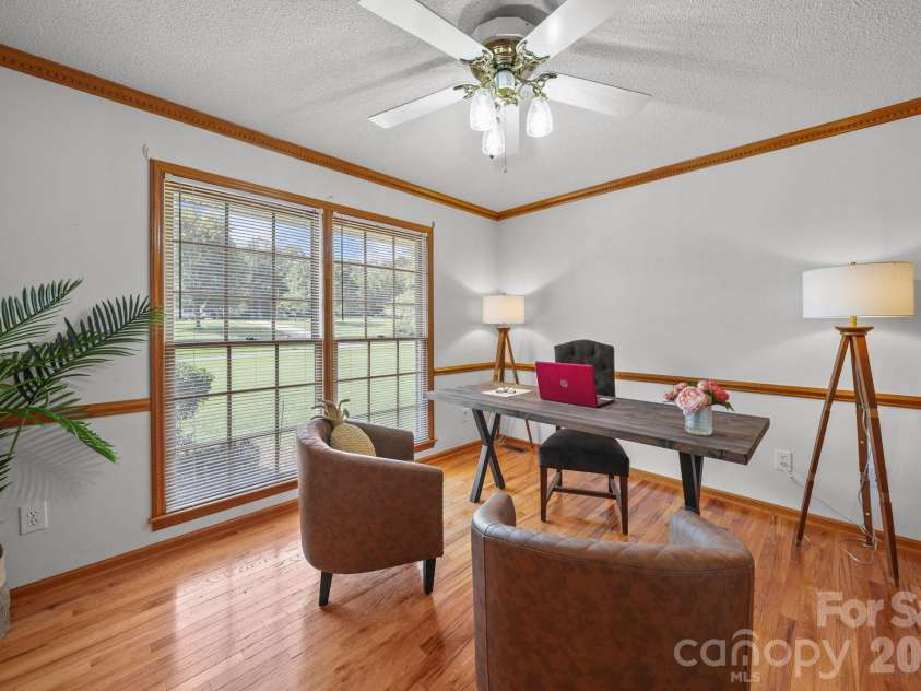 3008 Eaker Drive, Cherryville, NC 28021.  MLS# CAR4410929, YatesRealty ID 46228. Windows provide natural light for this bedroom which has been staged as an office.