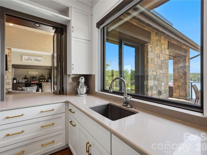 125 Quiet Waters Drive, Mooresville, NC 28117.  MLS# CAR4411417, YatesRealty ID 46231. 