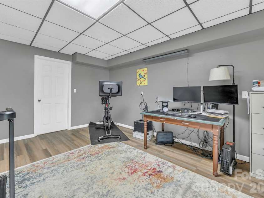 426 Meadowood Lane, Burnsville, NC 28714.  MLS# CAR4412082, YatesRealty ID 46234. Flex Space with Plumbing for Sink
