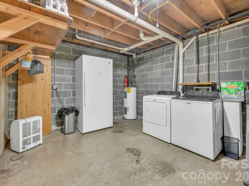 426 Meadowood Lane, Burnsville, NC 28714.  MLS# CAR4412082, YatesRealty ID 46234. Laundry in Basement