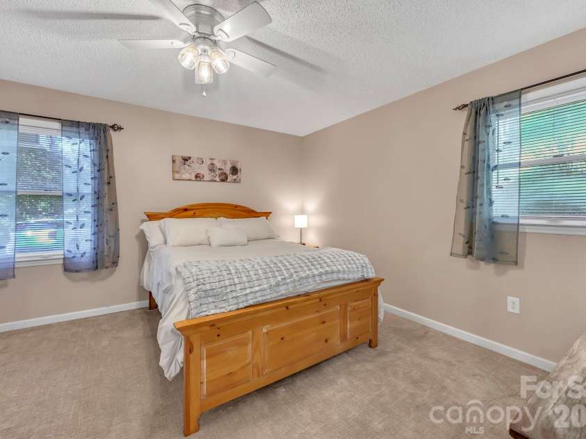426 Meadowood Lane, Burnsville, NC 28714.  MLS# CAR4412082, YatesRealty ID 46234. Primary Bedroom on Main