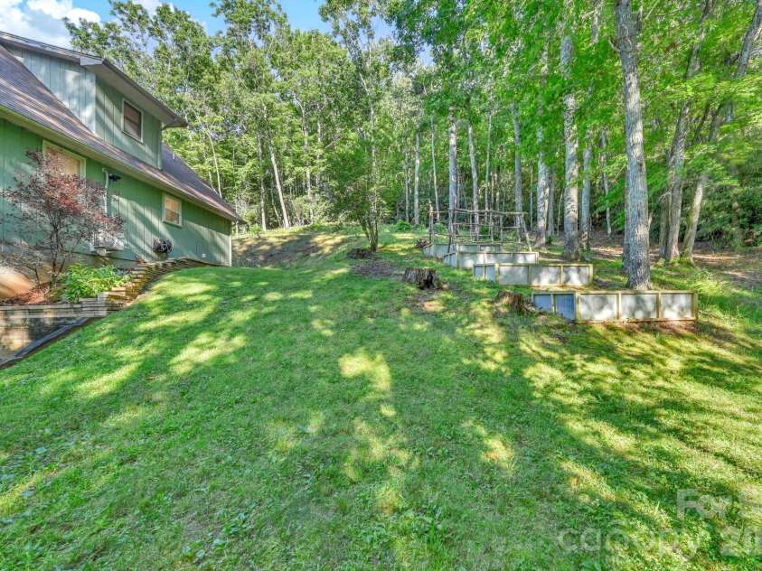 426 Meadowood Lane, Burnsville, NC 28714.  MLS# CAR4412082, YatesRealty ID 46234. Raised Beds for Gardens