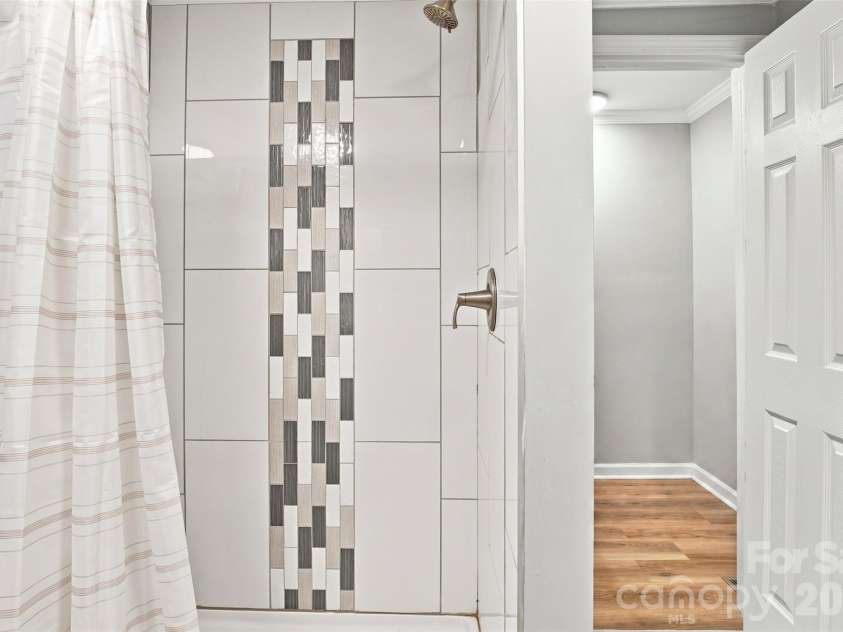 100 Nims Avenue, Mount Holly, NC 28120.  MLS# CAR4411668, YatesRealty ID 46235. Master Bathroom shower