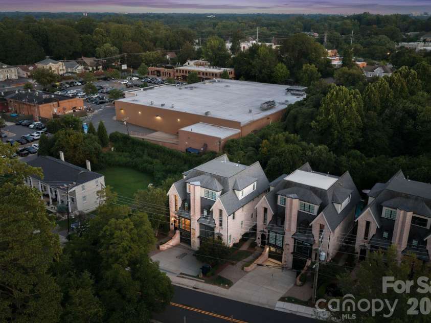 818 Ideal Way, Charlotte, NC 28203.  MLS# CAR4392342, YatesRealty ID 46239. Aerial side view at twilight