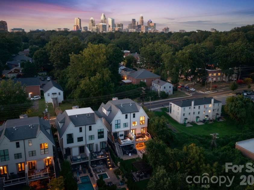 818 Ideal Way, Charlotte, NC 28203.  MLS# CAR4392342, YatesRealty ID 46239. Aerial side view at twilight