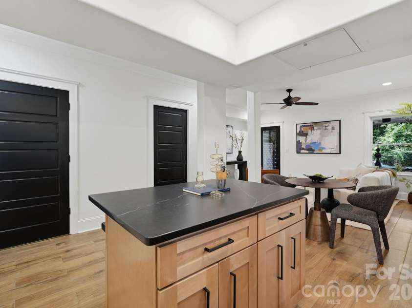 818 Ideal Way, Charlotte, NC 28203.  MLS# CAR4392342, YatesRealty ID 46239. Entertaining area with minibar (lower level)