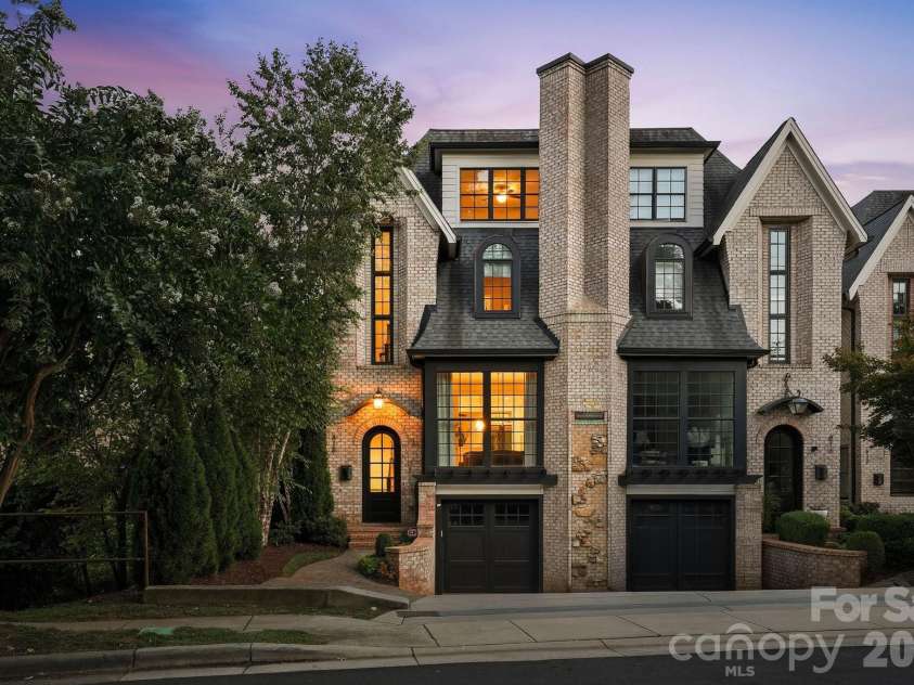 818 Ideal Way, Charlotte, NC 28203.  MLS# CAR4392342, YatesRealty ID 46239. Front exterior view at twilight