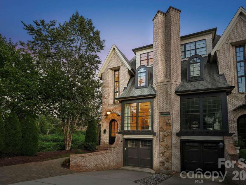 818 Ideal Way, Charlotte, NC 28203.  MLS# CAR4392342, YatesRealty ID 46239. Front exterior view at twilight