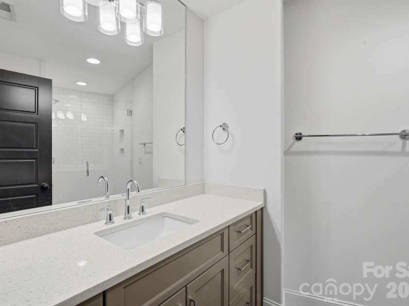 818 Ideal Way, Charlotte, NC 28203.  MLS# CAR4392342, YatesRealty ID 46239. Guest bathroom (second level)