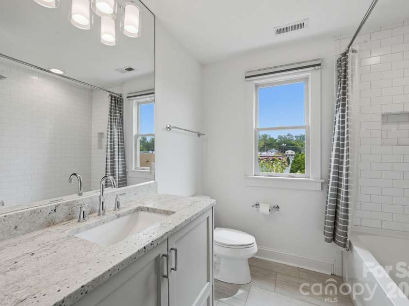 818 Ideal Way, Charlotte, NC 28203.  MLS# CAR4392342, YatesRealty ID 46239. Guest bathroom (third level)
