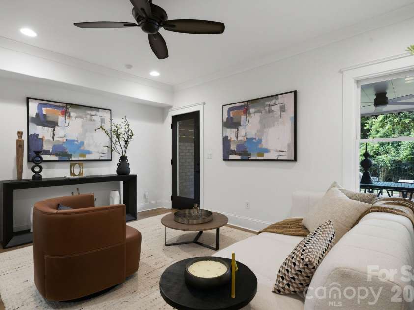 818 Ideal Way, Charlotte, NC 28203.  MLS# CAR4392342, YatesRealty ID 46239. Living room (lower level)