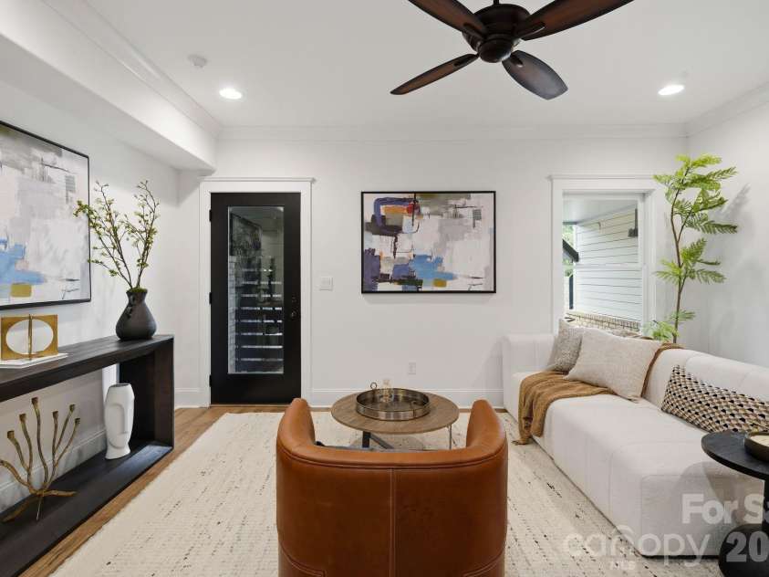 818 Ideal Way, Charlotte, NC 28203.  MLS# CAR4392342, YatesRealty ID 46239. Living room (lower level)