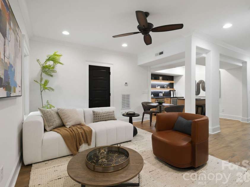 818 Ideal Way, Charlotte, NC 28203.  MLS# CAR4392342, YatesRealty ID 46239. Living room (lower level)