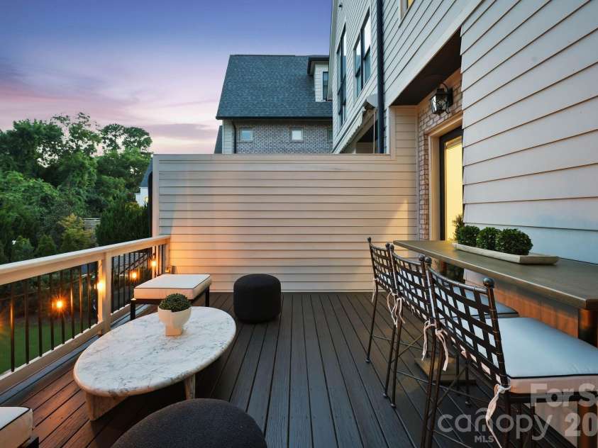 818 Ideal Way, Charlotte, NC 28203.  MLS# CAR4392342, YatesRealty ID 46239. Outdoor deck (main level)