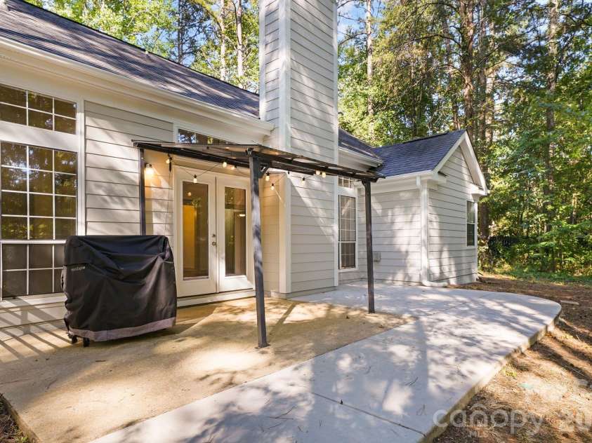 206 Aurora Lane, Huntersville, NC 28078.  MLS# CAR4416179, YatesRealty ID 46240. Back patio area