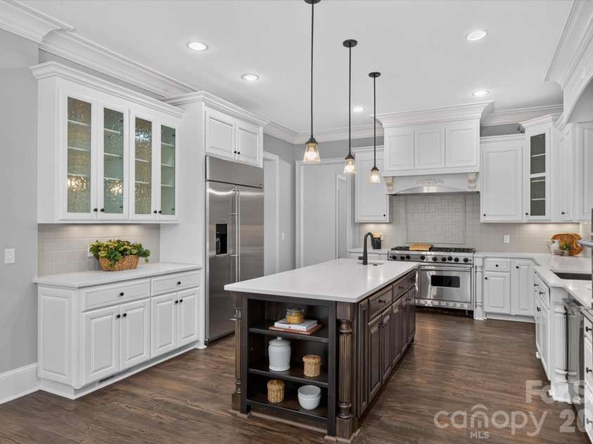 1025 Sherringham Way, Waxhaw, NC 28173.  MLS# CAR4411691, YatesRealty ID 46243. Gormet kitchen with new quartz top and new lighting