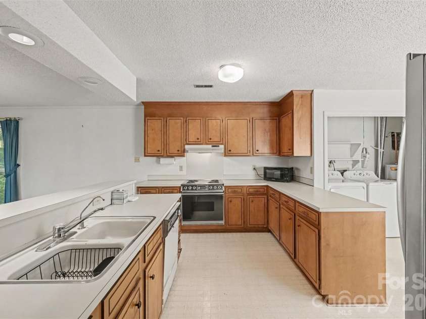8248 Oakley Lane, Charlotte, NC 28270.  MLS# CAR4417219, YatesRealty ID 46249. Ample storage and counter space