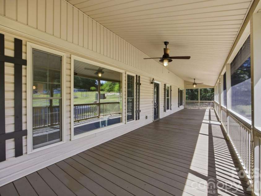 195 Azalea Road, Mooresville, NC 28115.  MLS# CAR4381056, YatesRealty ID 46251. Front Screened Porch