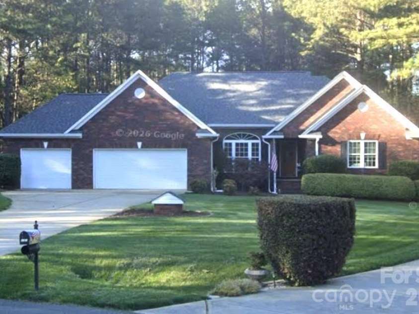 7267 Kiskadee Drive, Denver, NC 28037.  MLS# CAR4412592, YatesRealty ID 46255. Temporary front photo - beautiful setting in a cul de sac
