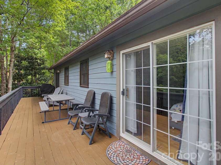 30 Whipporwill Drive, Weaverville, NC 28787.  MLS# CAR4344199, YatesRealty ID 46257. Freshly stained back deck
