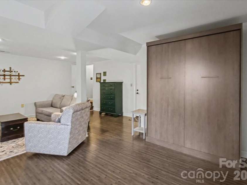 30 Whipporwill Drive, Weaverville, NC 28787.  MLS# CAR4344199, YatesRealty ID 46257. Murphy bed stores nicely