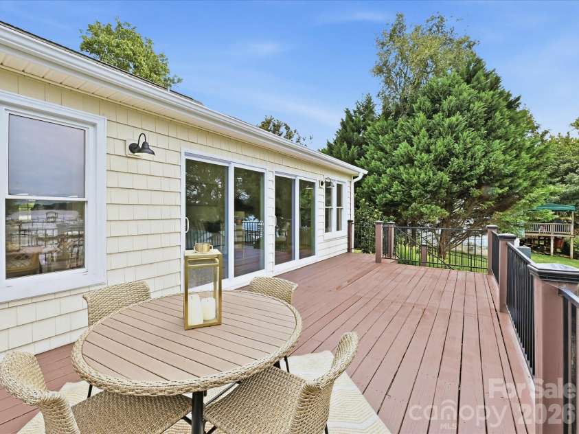 20845 Lagoona Drive, Cornelius, NC 28031.  MLS# CAR4417083, YatesRealty ID 46260. Expansive deck overlooking Lake Norman!