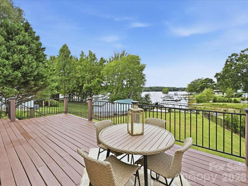 20845 Lagoona Drive, Cornelius, NC 28031.  MLS# CAR4417083, YatesRealty ID 46260. Large deck overlooking the lake!