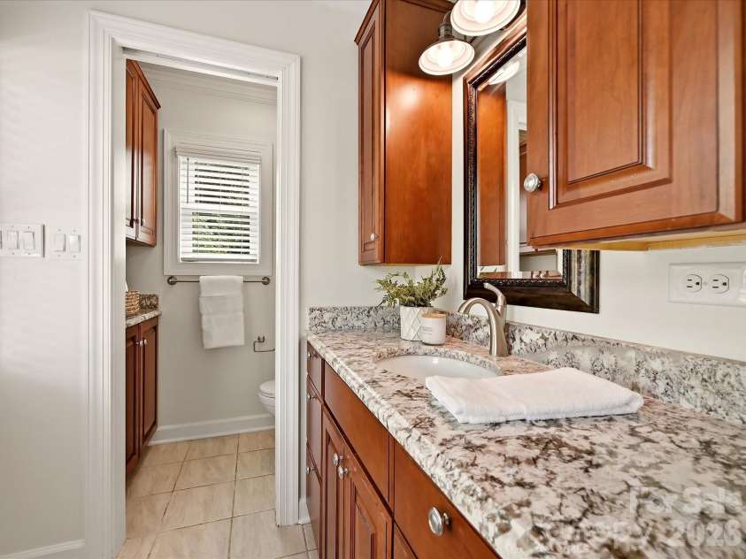20845 Lagoona Drive, Cornelius, NC 28031.  MLS# CAR4417083, YatesRealty ID 46260. Primary bathroom with granite counters and private shower!