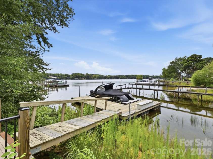 20845 Lagoona Drive, Cornelius, NC 28031.  MLS# CAR4417083, YatesRealty ID 46260. Private boat dock! Ready for a boat ride?