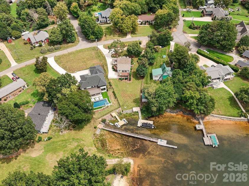 20845 Lagoona Drive, Cornelius, NC 28031.  MLS# CAR4417083, YatesRealty ID 46260. Set back in quiet cove!
