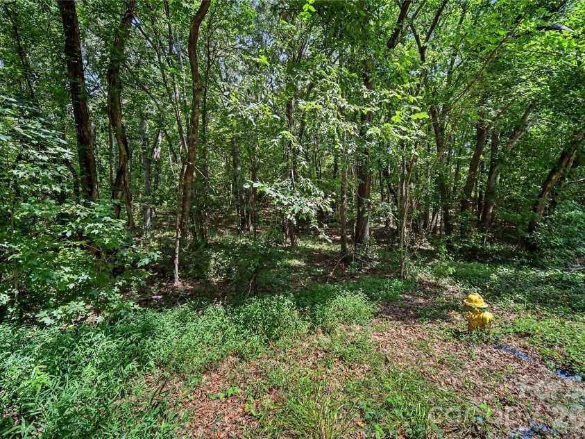 2402 Simfield Church Road, Matthews, NC 28105.  MLS# CAR4417312, YatesRealty ID 46263. 