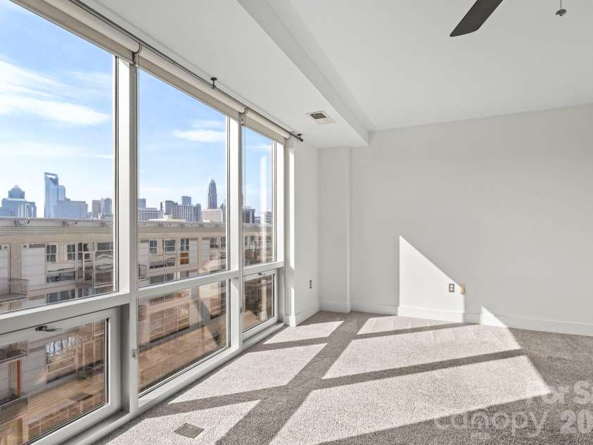 1133 Metropolitan Avenue, Charlotte, NC 28204.  MLS# CAR4363066, YatesRealty ID 4631. Primary bedroom has great uptown views