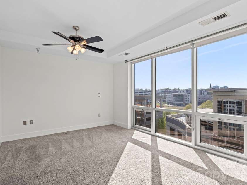 1133 Metropolitan Avenue, Charlotte, NC 28204.  MLS# CAR4363066, YatesRealty ID 4631. Primary bedroom has great uptown views