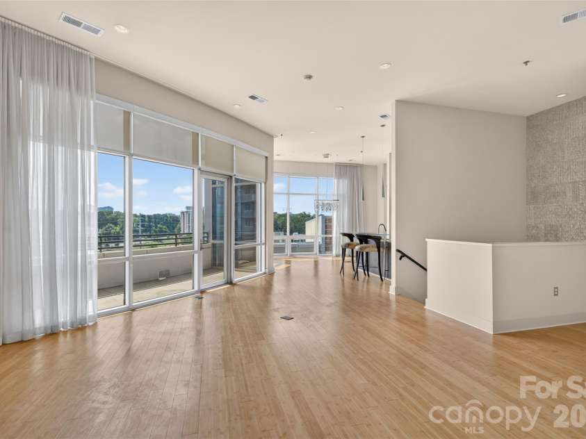 1133 Metropolitan Avenue, Charlotte, NC 28204.  MLS# CAR4412878, YatesRealty ID 4631. Floor to ceiling custom drapery