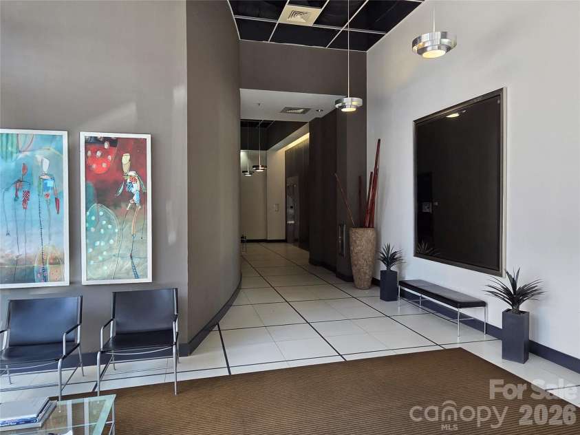 1133 Metropolitan Avenue, Charlotte, NC 28204.  MLS# CAR4412878, YatesRealty ID 4631. Met Lofts lobby