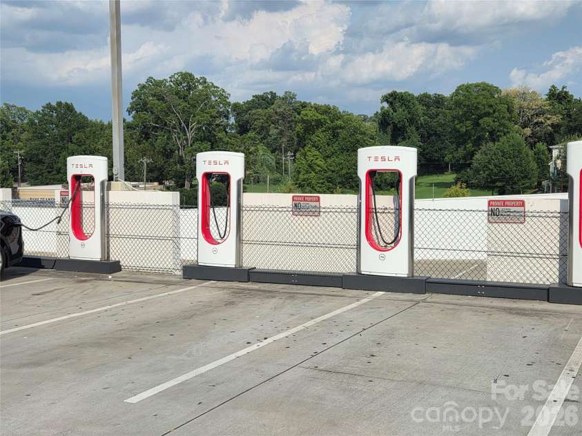 1133 Metropolitan Avenue, Charlotte, NC 28204.  MLS# CAR4412878, YatesRealty ID 4631. Tesla chargers