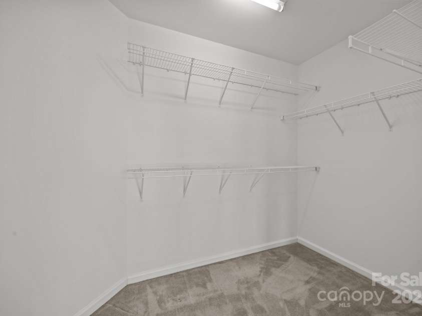 7262 April Mist Trail, Huntersville, NC 28078.  MLS# CAR4240563, YatesRealty ID 4631. Huge Walk In Closet Primary Bedroom Upper Level