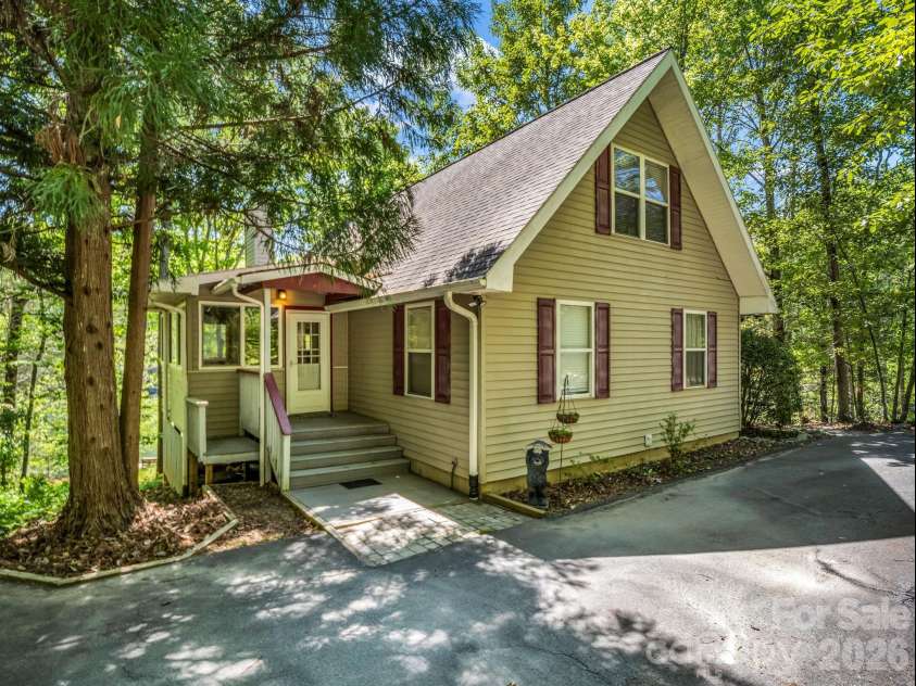 268 Mallard Road, Lake Lure, NC 28746.  MLS# CAR4372270, YatesRealty ID 46317. Front entry with circular driveway.