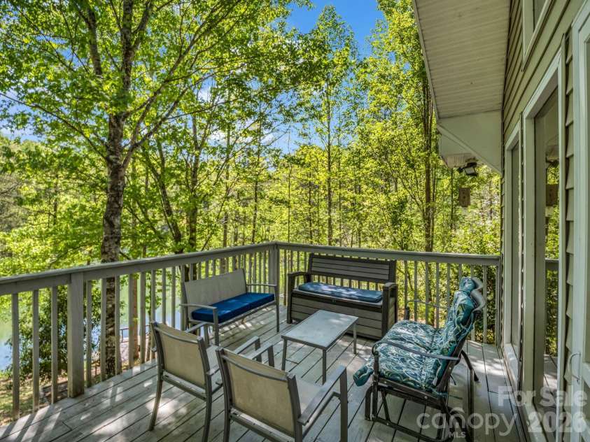 268 Mallard Road, Lake Lure, NC 28746.  MLS# CAR4372270, YatesRealty ID 46317. Shaded back deck with great views!
