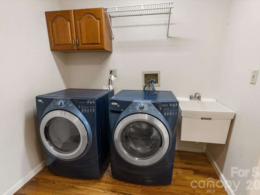 134 Valle Way, Hendersonville, NC 28739.  MLS# CAR4391167, YatesRealty ID 46320. Laundry in utility area next to Kitcheb