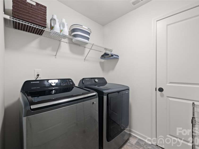 13141 Suncreek Terrace, Charlotte, NC 28214.  MLS# CAR4414116, YatesRealty ID 46322. Laundry room on second level