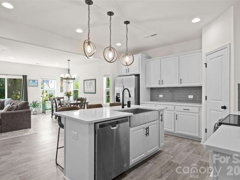 13141 Suncreek Terrace, Charlotte, NC 28214.  MLS# CAR4414116, YatesRealty ID 46322. Open-concept kitchen flows seamlessly into the dining and great room.