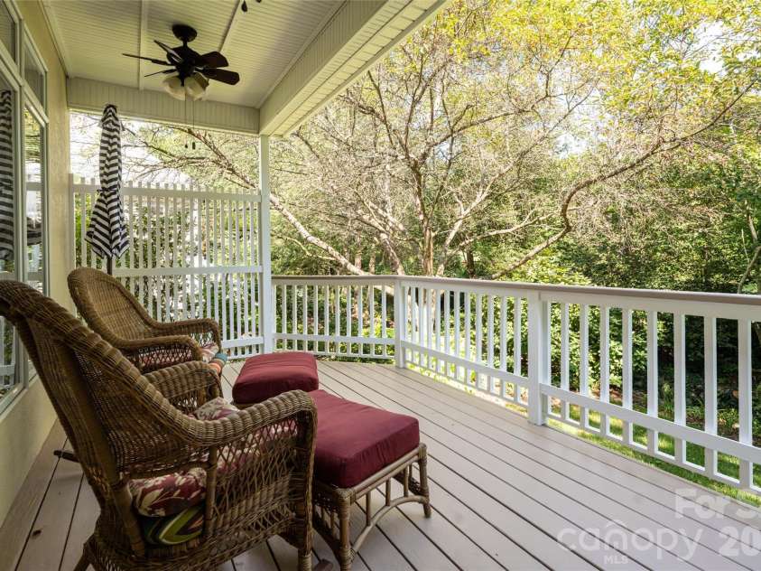 8 Clovelly Way, Asheville, NC 28803.  MLS# CAR4415587, YatesRealty ID 46324. Serene back deck